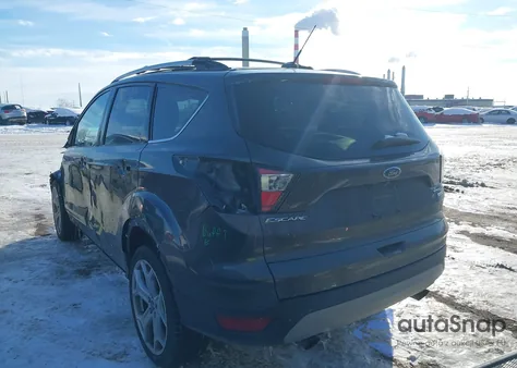 2017 Ford Escape Titanium from USA, damaged, VIN 1FMCU0J96HUD57570